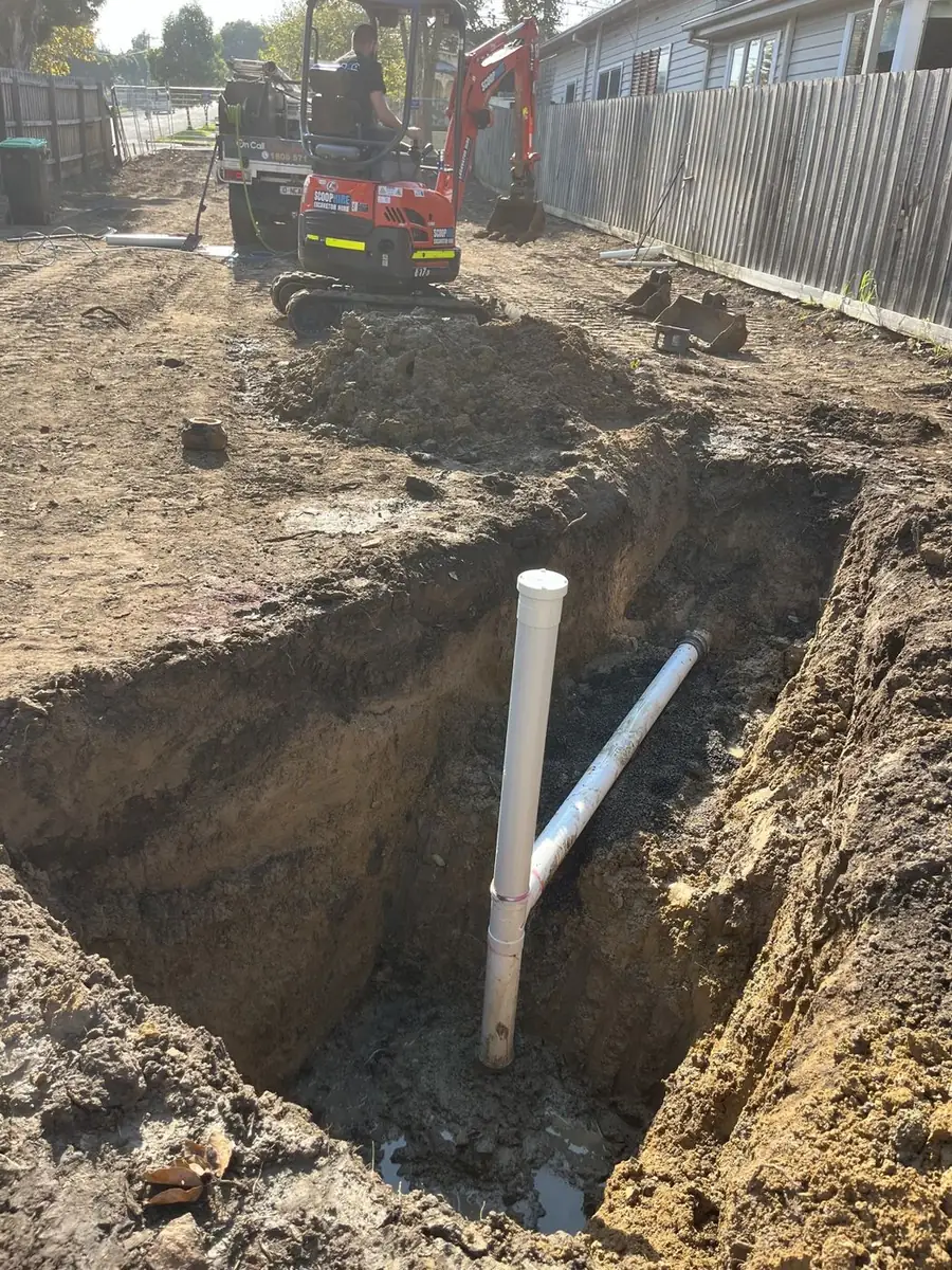 Exposed drain pipe in an excavation, Malvern