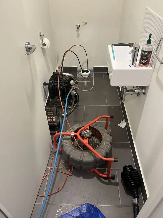 Drain clearing equipment in a laundry, Malvern